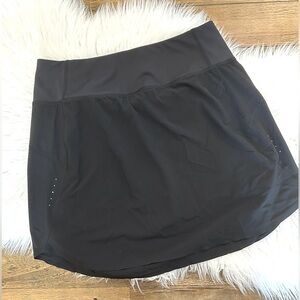 ATHLETA  Flawd Black Mini Tennis Pickleball Skirt with shorts back zip pocket